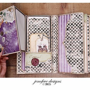 May include: An open scrapbook with a purple and floral cover, featuring a checkerboard and striped interior. The pages include tags, a wax seal, and decorative elements. The text "jenofeve designs &copy;2025" is visible.