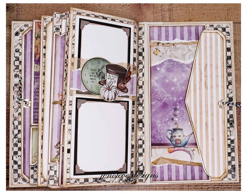 May include: A handmade scrapbook with an Alice in Wonderland theme. The pages feature purple and white stripes, blank photo frames, and decorative elements like a clock, hat, and pumpkin. The edges are adorned with a black and white checkered pattern.