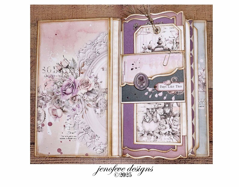May include: Open scrapbook with a floral design. The left page features a large floral arrangement with roses in shades of pink and purple. The right page has layered tags and pockets with vintage-style illustrations and the text "Days Like This."