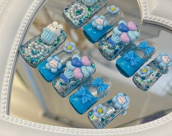 Uñas postizas de pato: uñas de gel con purpurina 3D y diamantes de imitación