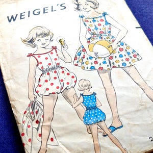 May include: Vintage Weigel's sewing pattern featuring illustrations of girls in summer dresses and rompers. The pattern includes a size 12. The illustrations depict dresses with floral and polka dot patterns, perfect for creating retro-style clothing.