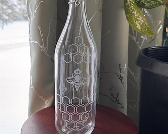 Swing top 32 ounce Glass Bottle. Sand etched