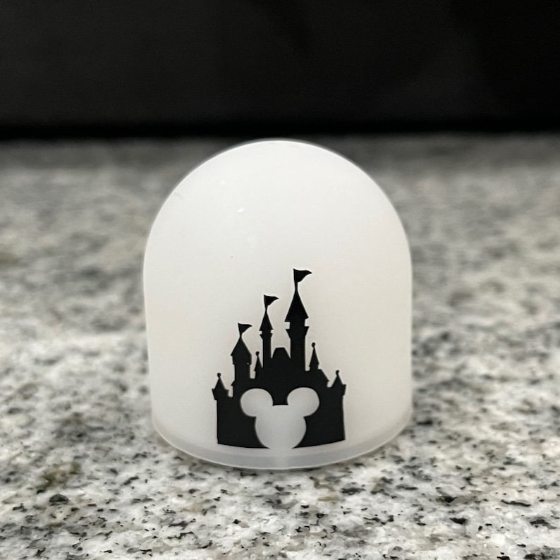 May include: White frosted glass dome with a black silhouette of Cinderella's castle and Mickey Mouse ears.