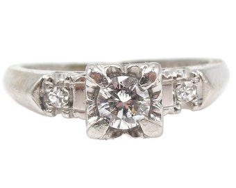 Quarter Carat (0.25ct) Platinum Illusion Set Diamond Engagement Ring with Accent Diamonds