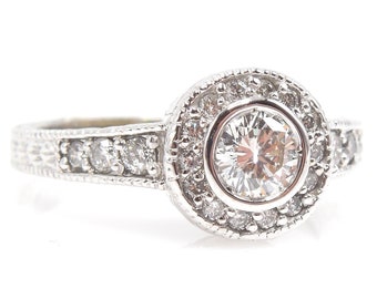 Half Carat Diamond Halo Engagement Ring in 18K White Gold