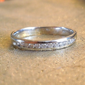 Channel Set Diamond and White Gold Wedding Band