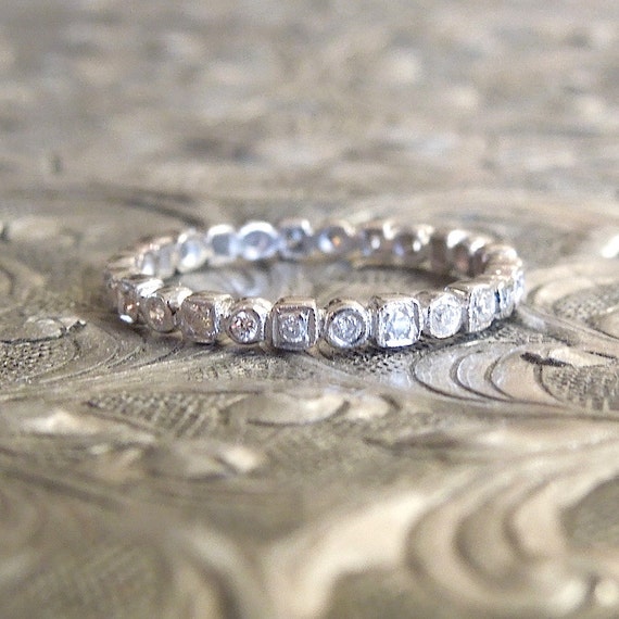 Thin Diamond and White Gold Eternity Band - image 1