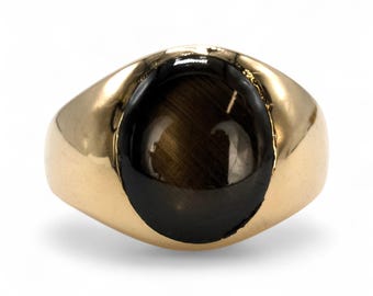 Anillo de sello ovalado de zafiro estrella negro en oro