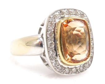 Approximately 6.00 Carat GIA Precious Topaz Ring with Diamond Halo in 18K