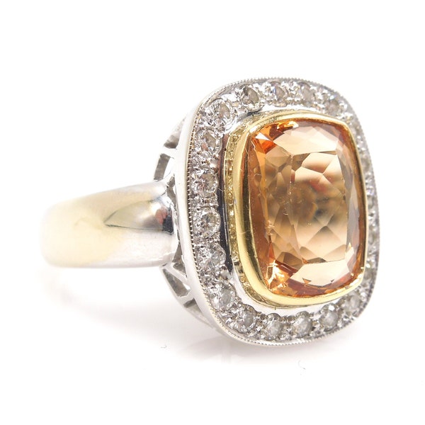 Ongeveer 6,00 karaat GIA kostbare topaasring met diamanten halo in 18K