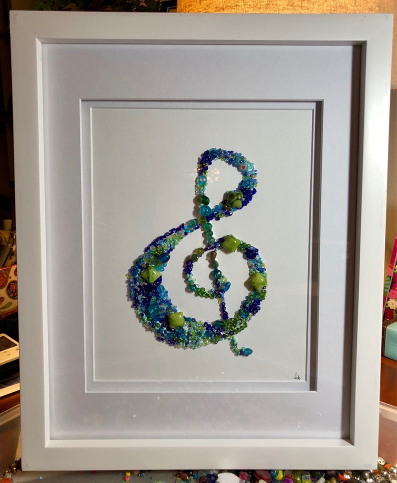 SOLD This original jewel tone mosaic beaded treble clef