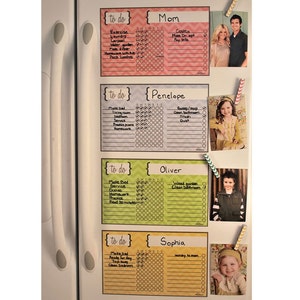 May include: A fridge door features four colourful to-do lists for family members, each with a name and tasks. Photos of each person are attached. The top chart is for "Mom," with a pink chevron design.
