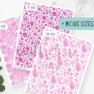 May include: Three sheets of floral patterned paper in shades of pink. The sheets are labeled with numbers and feature different floral designs. The text "+ MORE SIZES" is visible on the right side of the image. The paper is likely for crafting or scrapbooking.