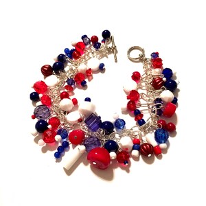 Bracelet.  Red, White and Blue. 7.75 inches long. Charm Bracelet. Double the Charms!