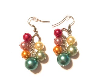 Earrings. Cluster of colorful pearl colored beads on silver colored ear wires.