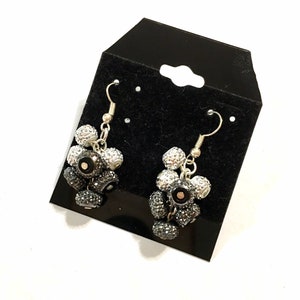 Black and silver sparkle cluster earrings.
