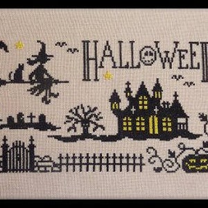 May include: Cross stitch pattern featuring a spooky Halloween scene with a witch flying on a broomstick, a haunted house, a graveyard, and the text "Happy Halloween Night".