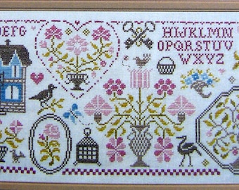 Quaker Sampler of Flowers 2 – counted cross stitch chart to work in 9 colours of DMC threads.  ABC Sampler. Quaker Sampler.
