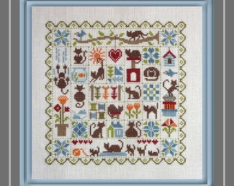 Patchwork Cats – counted cross stitch chart in a patchwork style with cat motifs.