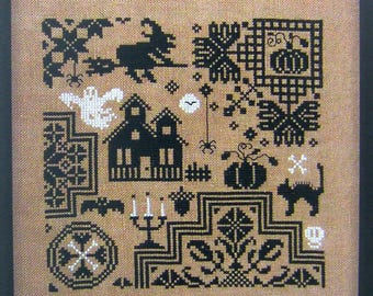 Quaker Halloween – counted cross stitch chart to work in monochrome.