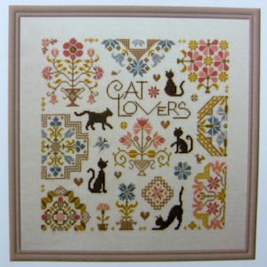 Cat Lovers counted cross stitch chart. Quaker cat design.