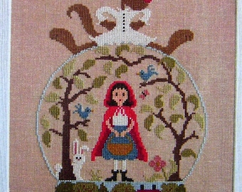 Little Red Riding Hood in a snow globe counted cross stitch chart.