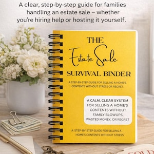 May include: A yellow spiral-bound "Estate Sale Survival Binder" with black text. The binder includes the title, "The Estate Sale Survival Binder", and text describing it as a guide for selling a home's contents without stress. Other items include keys, glasses, and a pen.