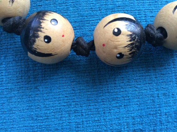 Beautiful Faces Wooden Beaded Necklace