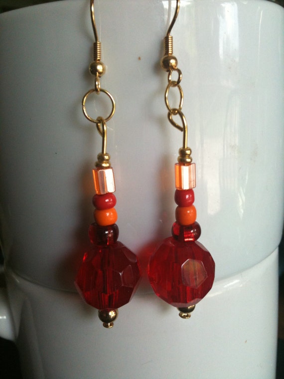 Items similar to Red Glass Beaded Earrings, on gold on Etsy
