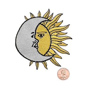 May include: Embroidered iron-on patch featuring a yellow sun with a crescent moon in front of it. The sun has a face and the moon has a face. The patch is about the size of a US penny.