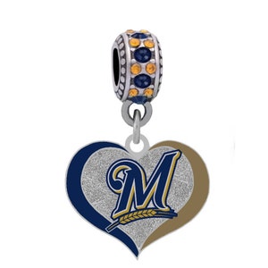 May include: Silver charm with a blue and gold heart featuring the Milwaukee Brewers logo. The charm has a crystal-encrusted bead.