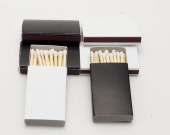 50 Plain wooden matches - 25 white & 25 Black jackets in cardboard box white heads