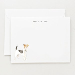 May include: White card with a black and white illustration of a wirehaired fox terrier. The text "ZOE GORDON" is printed in black at the top of the card.