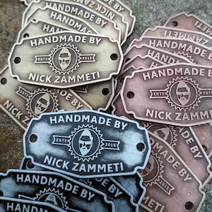 Zinc metal labels with relief for marking your products