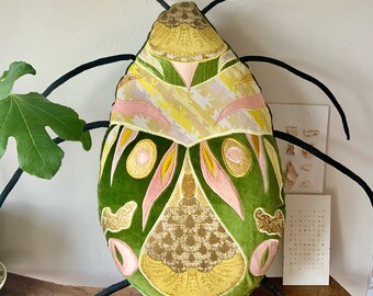 beetle botanical insect decorative pillow / cushion handmade in Brighton  using the finest vintage velvets and satin  fabrics .