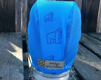 Ready to ship Navy Gorilla Outlines on Blue with Blue Mesh Hearing Aid hat for those with hearing aids/cochlear implants