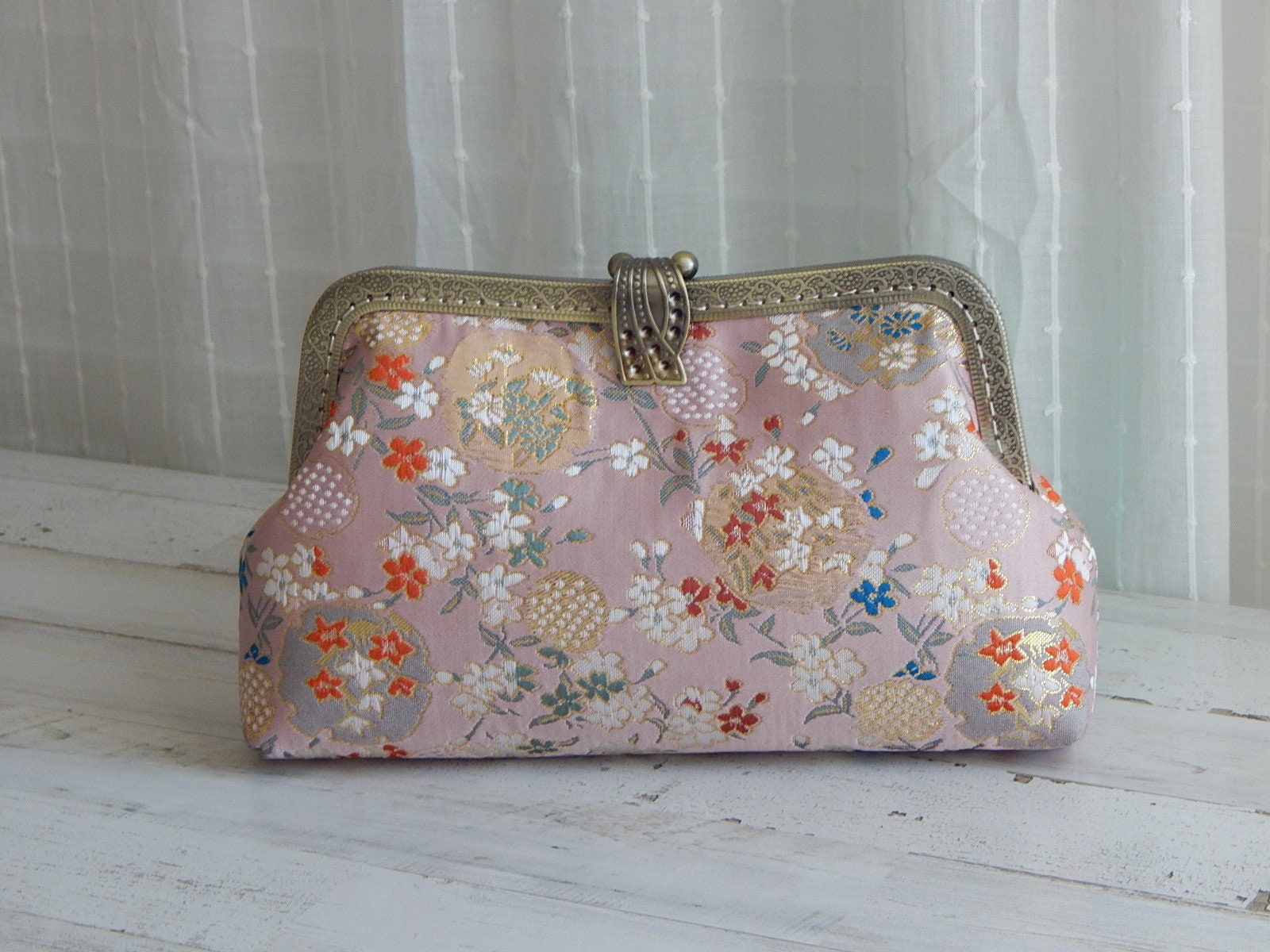 Blush clutch store