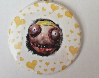 Zombie Monster with Hearts Metal Button Keyring 2.25"