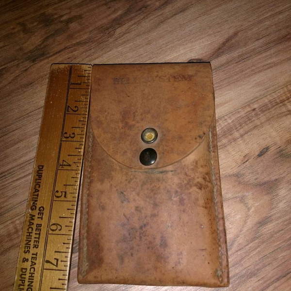 Vintage Bell Systems lineman's leather pouch with burnishing tools