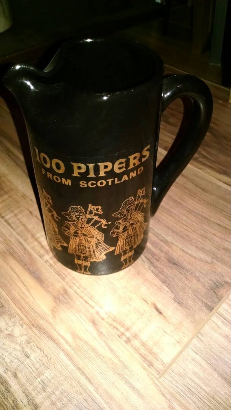 Vintage Seagram's 100 Pipers from Scotland ceramic pitcher image 1