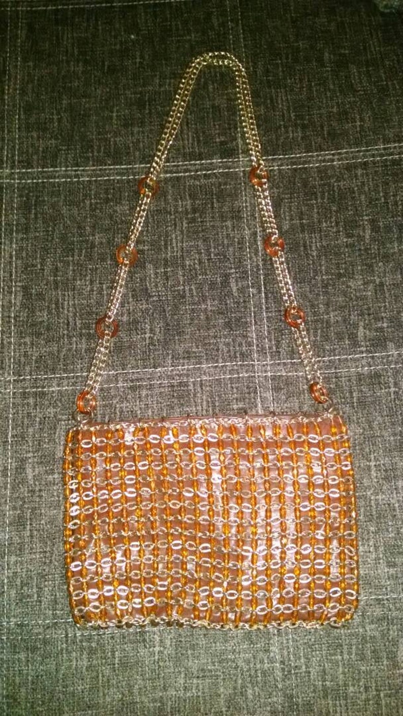 paco rabanne gold bag