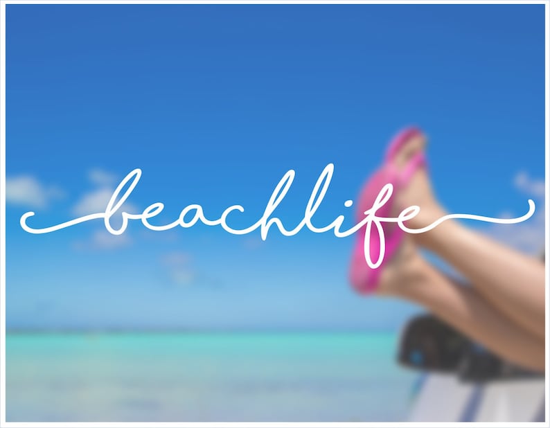 May include: The words "beachlife" in white script are displayed against a blurred background of a blue sky, ocean, and a person's legs with pink flip-flops. The image evokes a sense of relaxation and leisure.