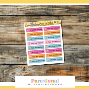 Puede incluir: Una hoja de pegatinas para planificador con el texto "Renew your medicine" y un icono de frasco de pastillas. Las pegatinas son rosas, naranjas y azules. El fondo es de madera. Para la planificación.