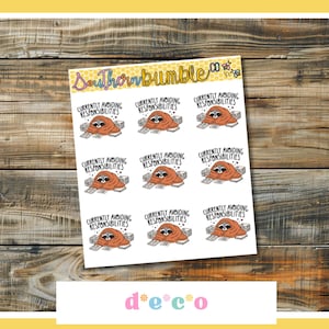 May include: A sticker sheet featuring nine identical illustrations of a raccoon wrapped in an orange blanket, surrounded by papers, with the text "CURRENTLY AVOIDING RESPONSIBILITIES" above each. The header reads "Southernbumble" with bee icons.