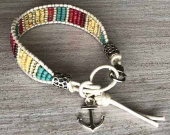 Nautical Beaded Bracelet. Leather Wrap, Seed Beads, Tiny Anchor Charm, Handcrafted by Clarky, Primary Colors and Silver.