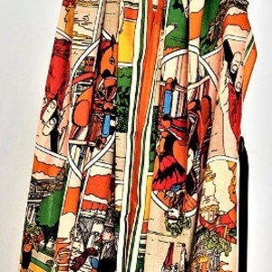 May include: A colorful silk scarf with a vintage illustration of horses and riders. The scarf is orange, green, yellow, and red with a white background. The scarf is hanging on a hanger.