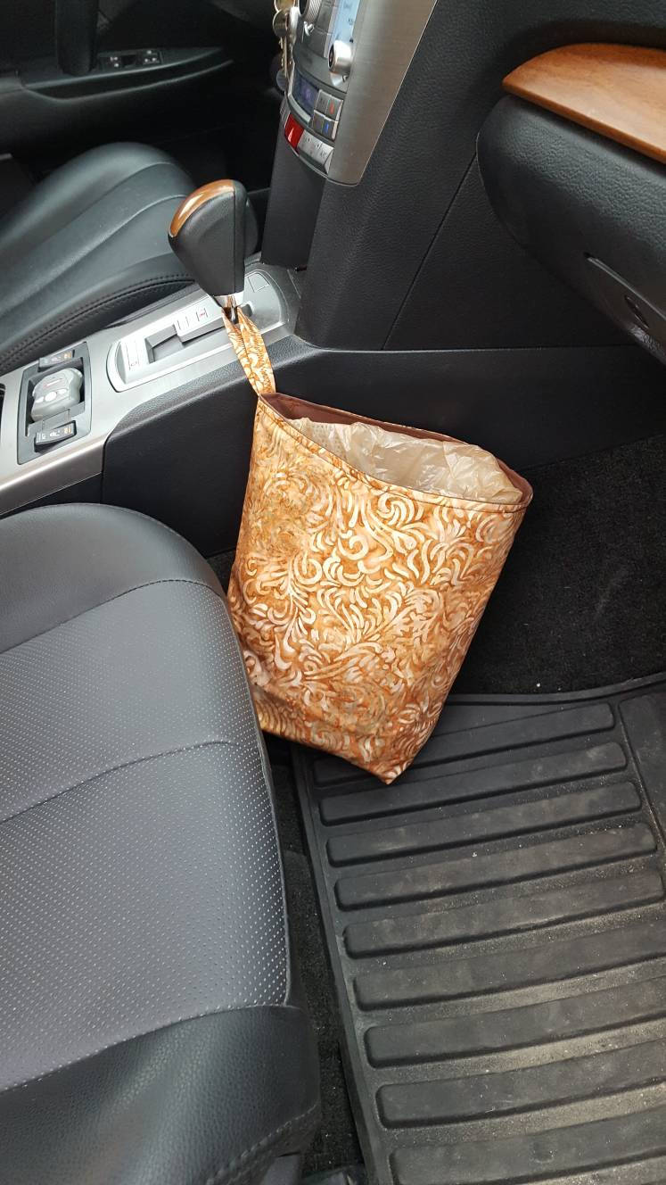 checking car seat garbage bag