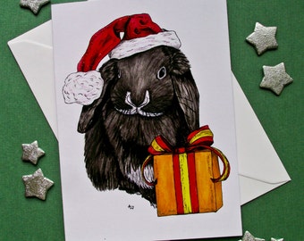 Coelhinho com cartão de Natal presente com glitter