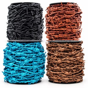 May include: Four spools of barbed wire in black, reddish-brown, bright blue, and metallic copper. Each spool is tightly wound with twisted wire strands featuring sharp, protruding barbs spaced evenly along the length of the wire.