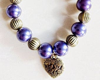 Purple and Gold Ribbed Metal Beaded Bracelet with Antique Brass Heart Feature